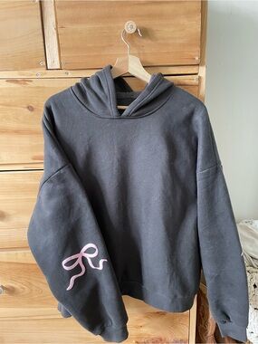 Edikted Black Hoodie with Pink Bows on Sleeve
